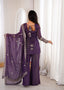 Back view of the Isha purple embroidered bell bottom suit set showing the dori tie detail, dupatta and wide leg trousers.