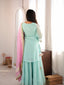 Back view of the Mira mint sharara suit set showing the top, matching sharara trousers and pink dupatta.