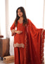 Full length front view of the Zarina rust farshi shalwar suit set with embroidered top, matching shalwar and draped dupatta.