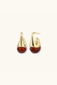 Amber Flow Drops gold plated resin drop earrings with amber-toned round resin and sculptural curved setting