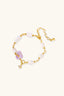 Pastel gemstone and freshwater pearl wrap bracelet with gold centrepiece and butterfly charm