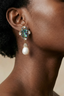 Model wearing Abalone Pearl Drops statement abalone shell earrings with pearl drop