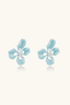 Pair of oversized blue flower stud earrings in 18K gold plated brass