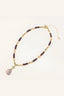 Full view of 14K gold plated amethyst pearl necklace with baroque pearl pendant and pearl-tipped extend