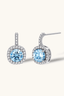 Azure Radiance sterling silver blue moissanite cushion halo drop earrings angled close-up
