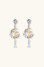 Front view of Vesper Star Drops statement earrings with twin star motif and clear drop stones