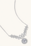 Close-up of moissanite wing motif and halo drop pendant on sterling silver chain
