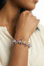 Model wearing pastel crystal pearl cuff bracelet on wrist