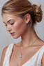 woman wearing silver blue moissanite pendant necklace with feather details