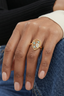 Model wearing Enchanted Garden Ring gold plated turquoise filigree ring with cubic zirconia detail
