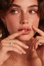 Eternal Spark Ring styled with layered gold jewellery, close-up model setting