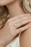 Gold plated oval zirconia ring worn on finger elegant jewellery styling