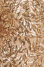 Close-up of gold leaf sequin mesh fabric