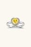 Radiant Heart Halo Ring sterling silver with heart-cut golden moissanite and halo setting front view”