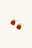 Angled view of cushion red agate studs in 18K gold vermeil