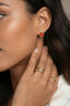 Model wearing red agate and gold vermeil stud earrings close-up