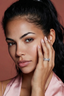 Model wearing Eternal Crossover Moissanite Ring sterling silver infinity band on finger
