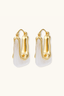 Liquid Curve Hoops 18K gold-plated hoop earrings showing sculptural curve and white resin, side view