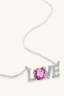 Close view of sterling silver LOVE pendant necklace with pink moissanite