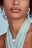 Model 2 wearing Pearl Halo Necklace — freshwater pearl pendant with crystal halo on sterling silver chain