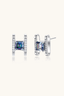 Geometric 925 sterling silver square moissanite stud earrings angled detail