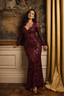 Model wearing Serenade Gold sequin fishtail maxi dress