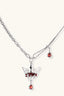 Crown pendant statement necklace with red enamel and red teardrop stone on adjustable chain