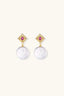 Royal Garden Pearl Drops, front view, baroque pearls and ruby-pink stud detail
