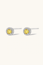 close-up of round yellow moissanite halo stud earrings