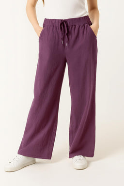 Viola Reale front view — purple drawstring wide-leg trousers, Made in Italy
