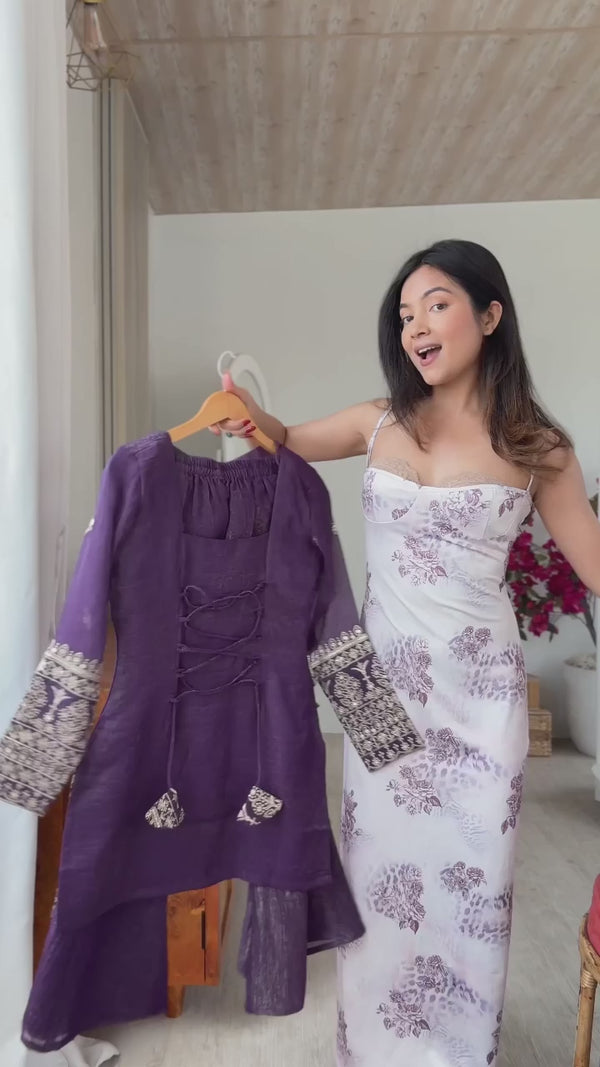 Model wearing the Isha purple embroidered bell bottom suit set with matching dupatta, full front view, video.